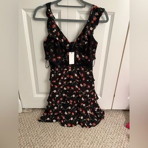Sugar lips Black mini floral dress with adjustable straps and lace detail